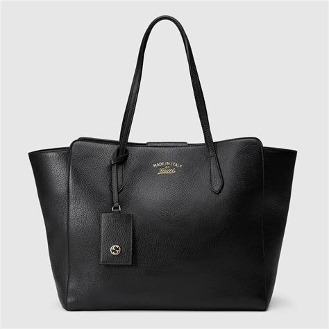 gucci swing bag review|Why Gucci's Swing Leather Tote Is An Instant Classic.